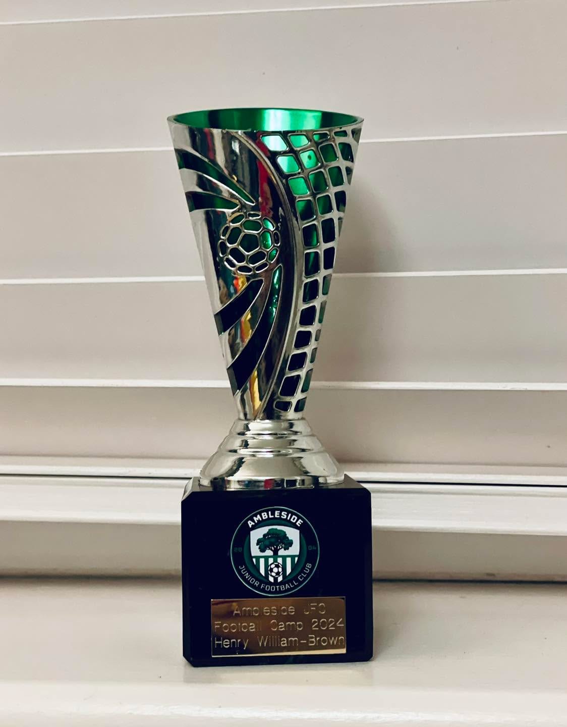 My Ambleside JFC football camp trophy