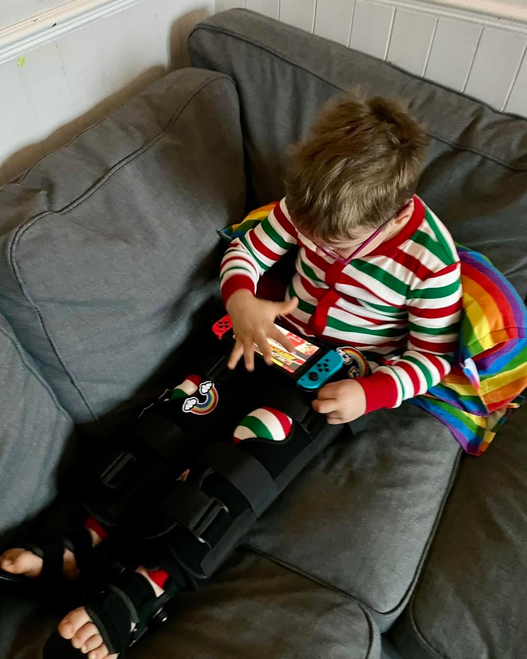 Gaiter time on the sofa — made bearable by Mario Kart